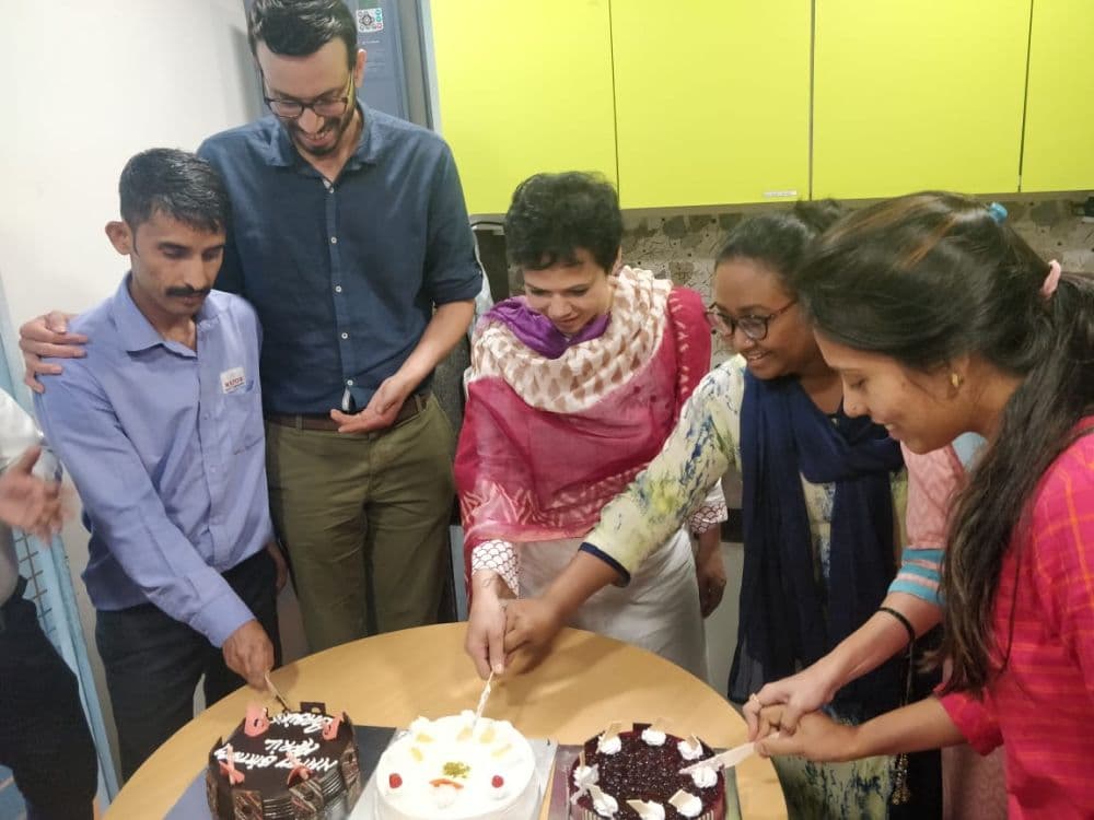 Career Milestones Celebration: Team celebrates achievements and embraces new challenges